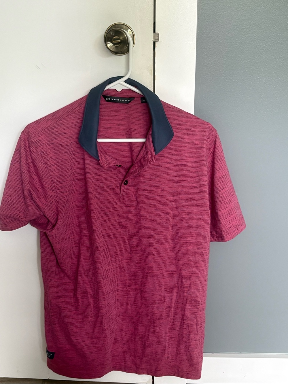 Travis Mathew Heathered Pink Polo with Dark Navy Collar
